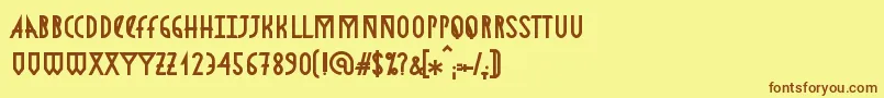 フォントAstronmicaBold – 茶色の文字が黄色の背景にあります。