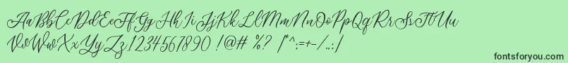 Шрифт Athalia DEMO – чёрные шрифты на зелёном фоне