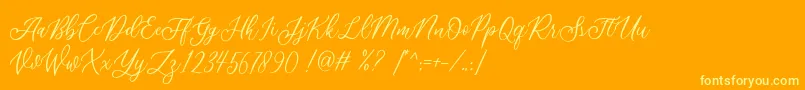 Шрифт Athalia DEMO – жёлтые шрифты на оранжевом фоне