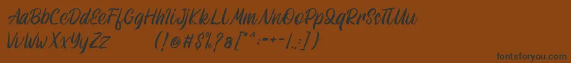 Athenic Font – Black Fonts on Brown Background