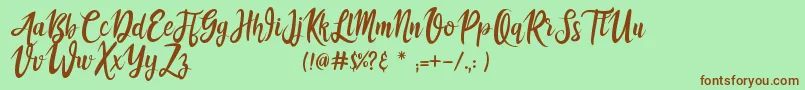 athika Font – Brown Fonts on Green Background