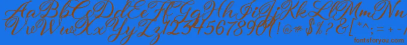 atmaka Font – Brown Fonts on Blue Background