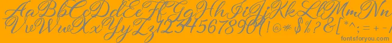 atmaka-Schriftart – Graue Schriften auf orangefarbenem Hintergrund