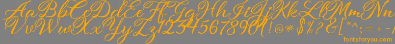 atmaka Font – Orange Fonts on Gray Background