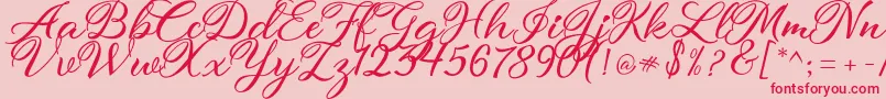 atmaka-Schriftart – Rote Schriften auf rosa Hintergrund