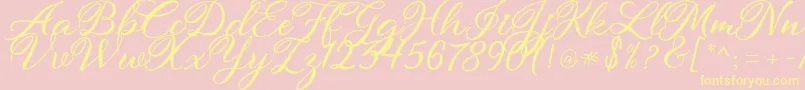 atmaka-Schriftart – Gelbe Schriften auf rosa Hintergrund