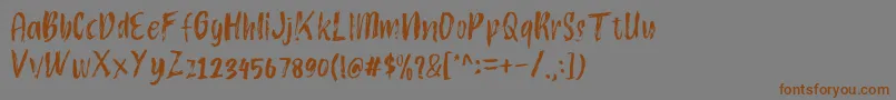 Atokous Font – Brown Fonts on Gray Background