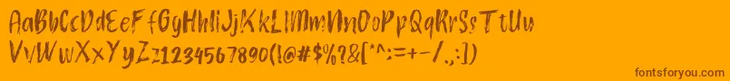 Atokous Font – Brown Fonts on Orange Background