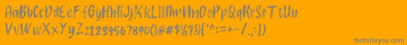フォントAtokous – オレンジの背景に灰色の文字