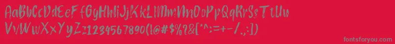 フォントAtokous – 赤い背景に灰色の文字