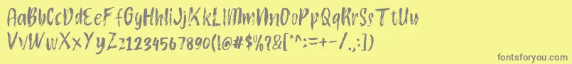 Atokous Font – Gray Fonts on Yellow Background