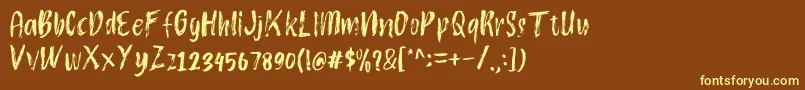 Atokous Font – Yellow Fonts on Brown Background