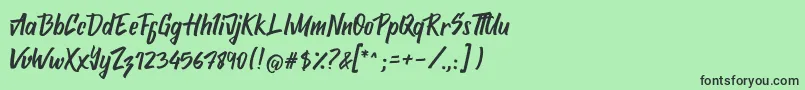 フォントAttemptyon – 緑の背景に黒い文字