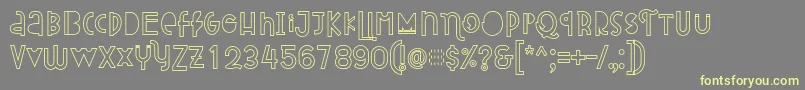 Attracted Monday Outline Font – Yellow Fonts on Gray Background