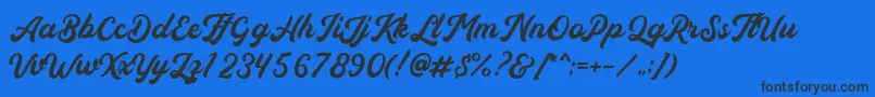Auckland Free Font – Black Fonts on Blue Background