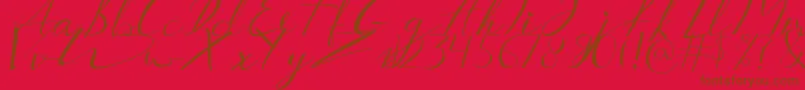 Aucklands Script-Schriftart – Braune Schriften auf rotem Hintergrund