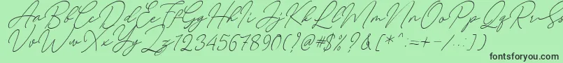 August Script Bold Free Font – Black Fonts on Green Background