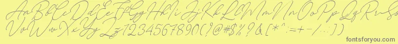 フォントAugust Script Bold Free – 黄色の背景に灰色の文字