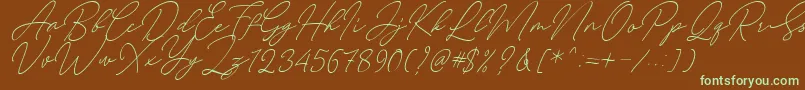 August Script Bold Free Font – Green Fonts on Brown Background
