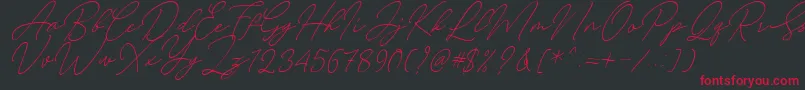 Czcionka August Script Bold Free – czerwone czcionki na czarnym tle