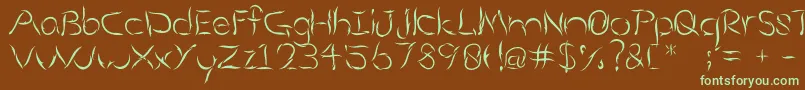 フォントAumakua – 緑色の文字が茶色の背景にあります。