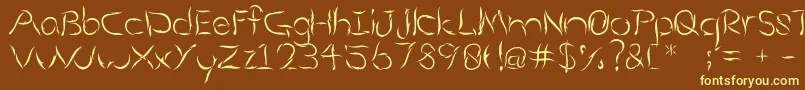 Aumakua-fontti – keltaiset fontit ruskealla taustalla