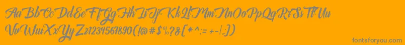 Auntekhno Free Personal-Schriftart – Graue Schriften auf orangefarbenem Hintergrund