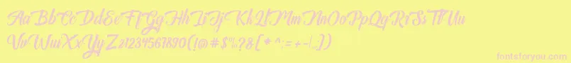 Auntekhno Free Personal-fontti – vaaleanpunaiset fontit keltaisella taustalla