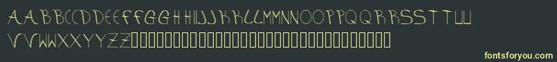 aura Font – Yellow Fonts on Black Background