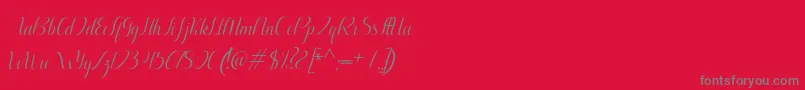 Fonte Aurelia italic – fontes cinzas em um fundo vermelho