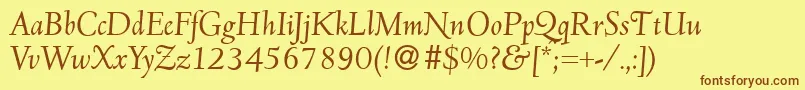 フォントD690RomanItalic – 茶色の文字が黄色の背景にあります。