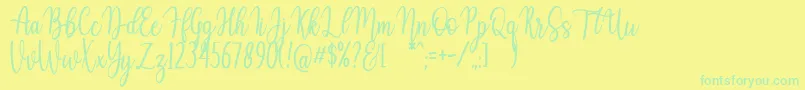 フォントAuristela Script – 黄色い背景に緑の文字