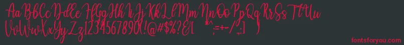 Fonte Auristela Script – fontes vermelhas em um fundo preto