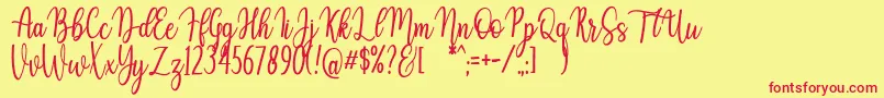 Fonte Auristela Script – fontes vermelhas em um fundo amarelo