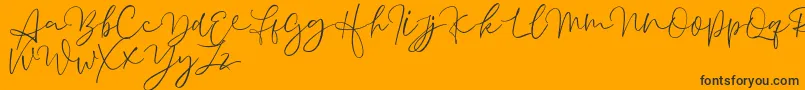 Aussiente Free Version-Schriftart – Schwarze Schriften auf orangefarbenem Hintergrund