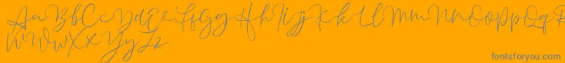 Шрифт Aussiente Free Version – серые шрифты на оранжевом фоне