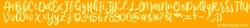 Austhina Brush Calligraphy Scratch -Schriftart – Gelbe Schriften auf orangefarbenem Hintergrund