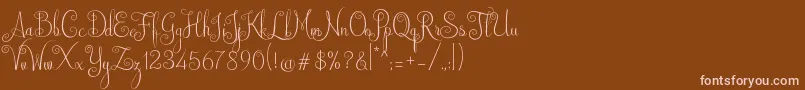 フォントAustralian Script – 茶色の背景にピンクのフォント