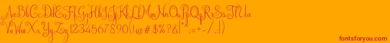 Czcionka Australian Script – czerwone czcionki na pomarańczowym tle