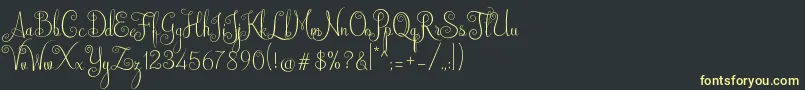 フォントAustralian Script – 黒い背景に黄色の文字