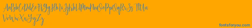 Australis free Font – Blue Fonts on Orange Background