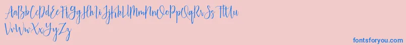 Australis free-Schriftart – Blaue Schriften auf rosa Hintergrund