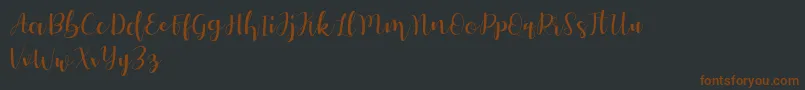 Autery Font – Brown Fonts on Black Background