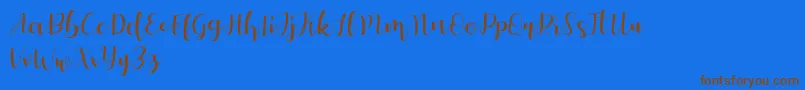 Autery Font – Brown Fonts on Blue Background