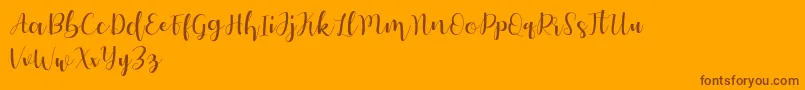 Autery Font – Brown Fonts on Orange Background