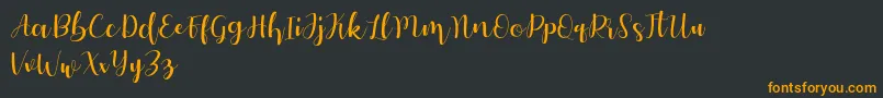 Autery Font – Orange Fonts on Black Background