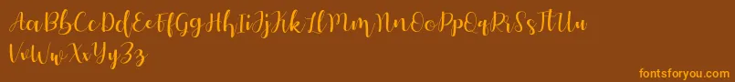 Autery Font – Orange Fonts on Brown Background