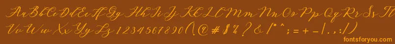 Autines Script Font – Orange Fonts on Brown Background