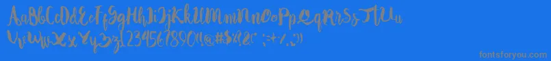 フォントAutodidact – 青い背景に灰色の文字