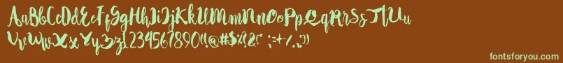 フォントAutodidact – 緑色の文字が茶色の背景にあります。